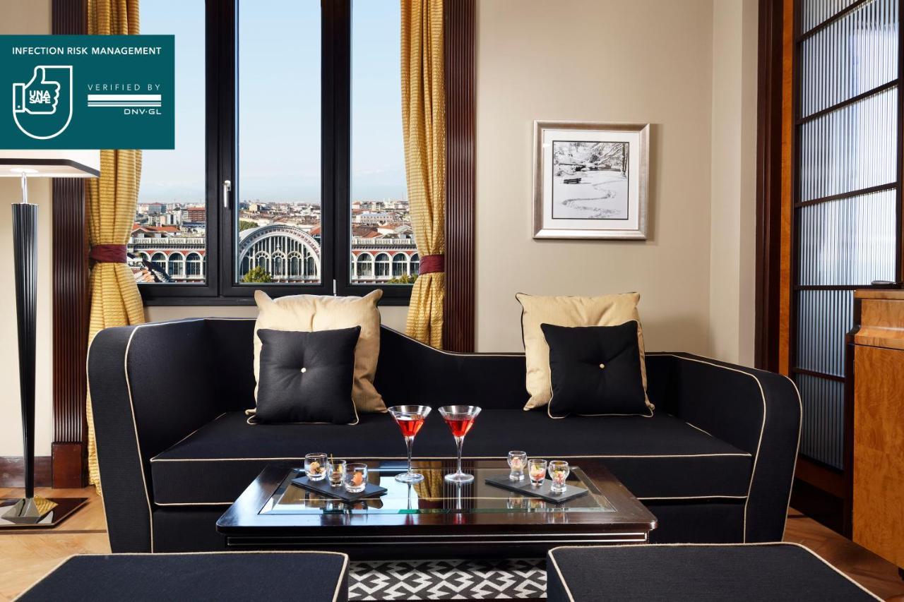 Principi Di Piemonte | Una Esperienze Turin Extérieur photo A living room in a serviced apartment in Athens, Greece